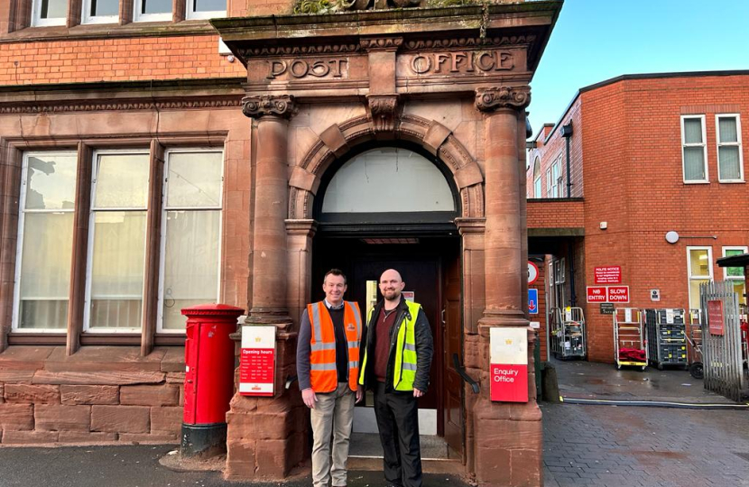 Stuart on a previous visit to a local post office