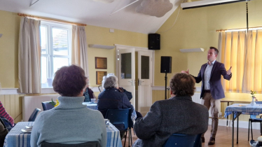 Stuart listening to residents